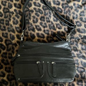 Small black shoulder bag with zipper detailing